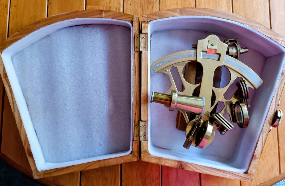 Brass sextant in a fitted wooden case