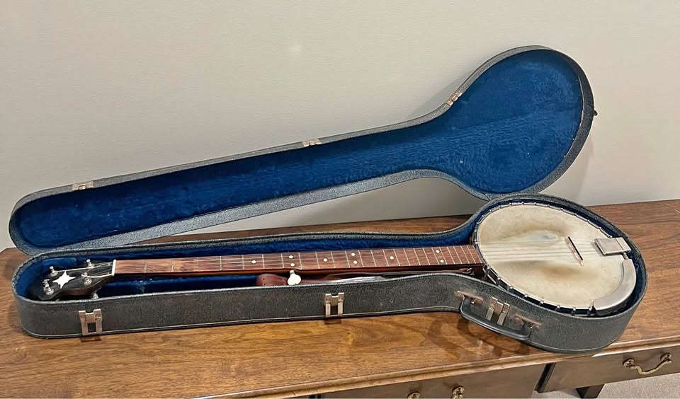 Christy banjo with blue-lined case